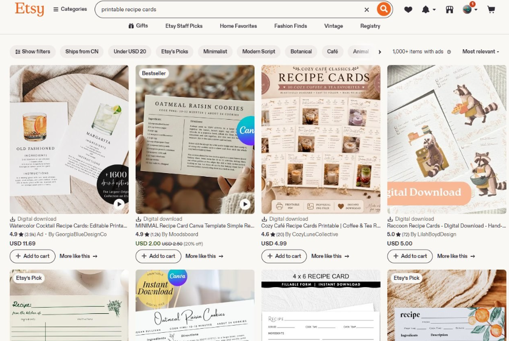 Etsy搜索printable recipe cards的结果页,1000+件商品,价格分别是11.69美金、2.00美金、4.99美金、5.00美金,头部产品带Bestseller标记和4.9星3.9k条评价