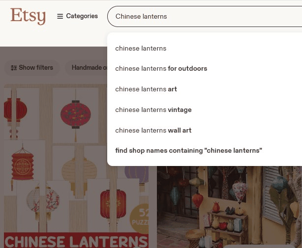 Etsy搜索框下拉推荐词,显示户外灯笼、灯笼艺术、复古灯笼、墙饰等长尾方向